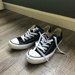 Black low top converse sneakers